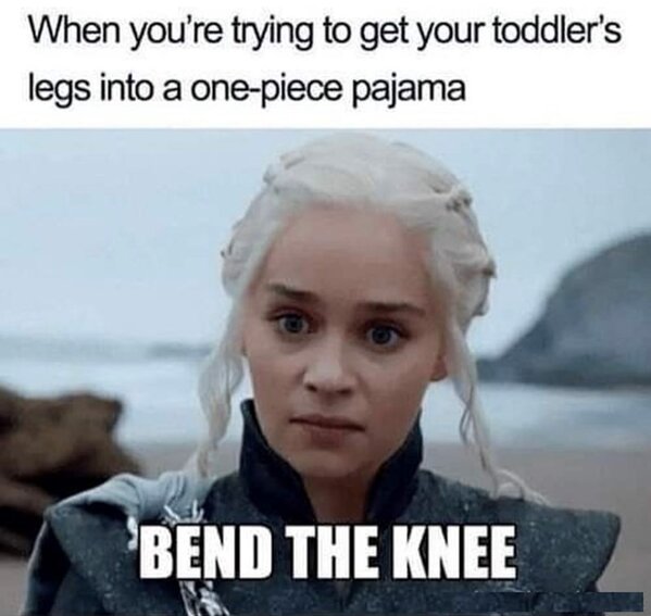 trying-get-toddlers-legs-into-one-piece-pajama-bend-knee.jpg