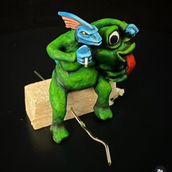 skink frog mascot smoke break 1.jpg