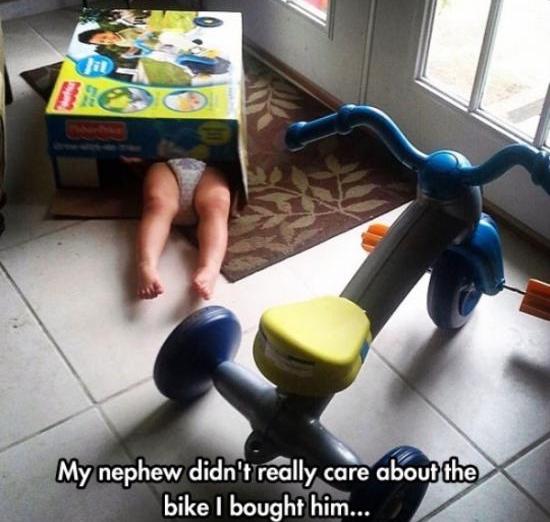 funny-baby-inside-box-playing-tricycle.jpg